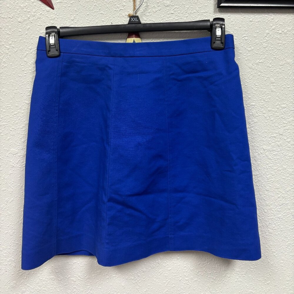Elevate your workwear with the Vince Camuto Short Office Blue Skirt, a perfect b